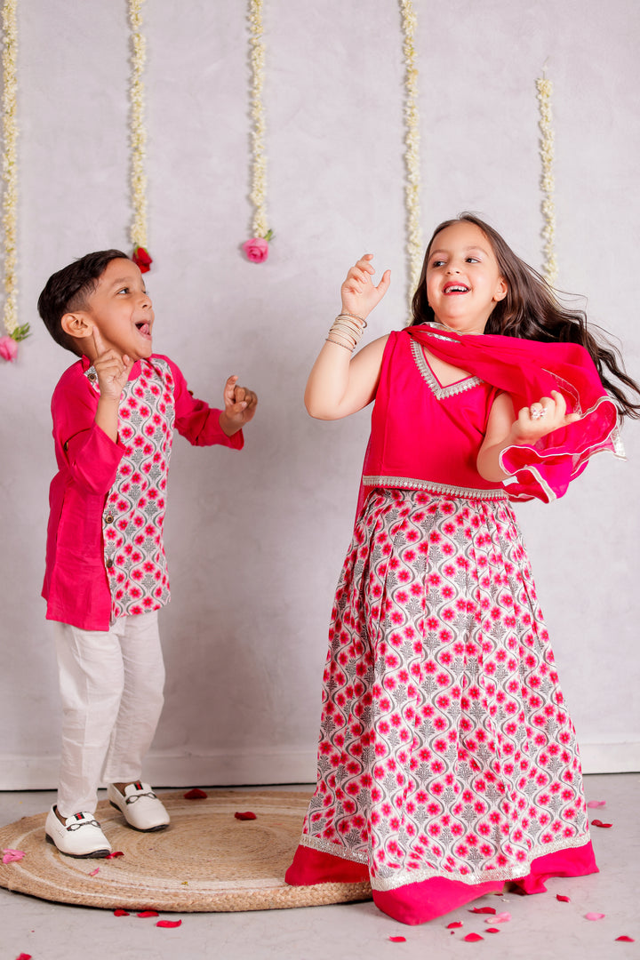 BOYS PINK FLORAL SIDE BUTTON KURTA WITH PAJAMA (SET OF 2) + GIRLS PINK FLORAL LEHENGA WITH FUCHSIA TOP AND DUPATTA (SET OF 3)