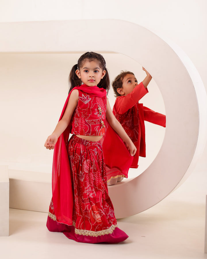 Girls Red Bandhani Print Lehenga Choli Set (Set of 3) + Boys Red Bandhani Festive Kurta Jacket Set (Set of 3)