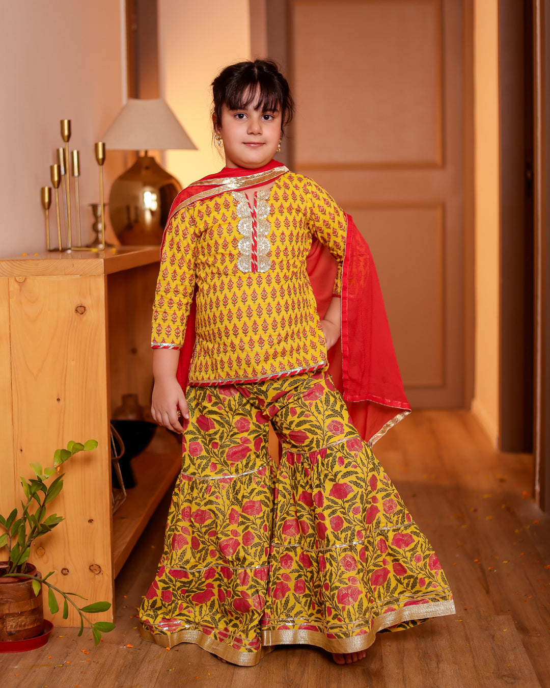 Girls Bright Yellow Floral Printed Kurti & Tiered Sharara with Red Dupatta (Set of 3)