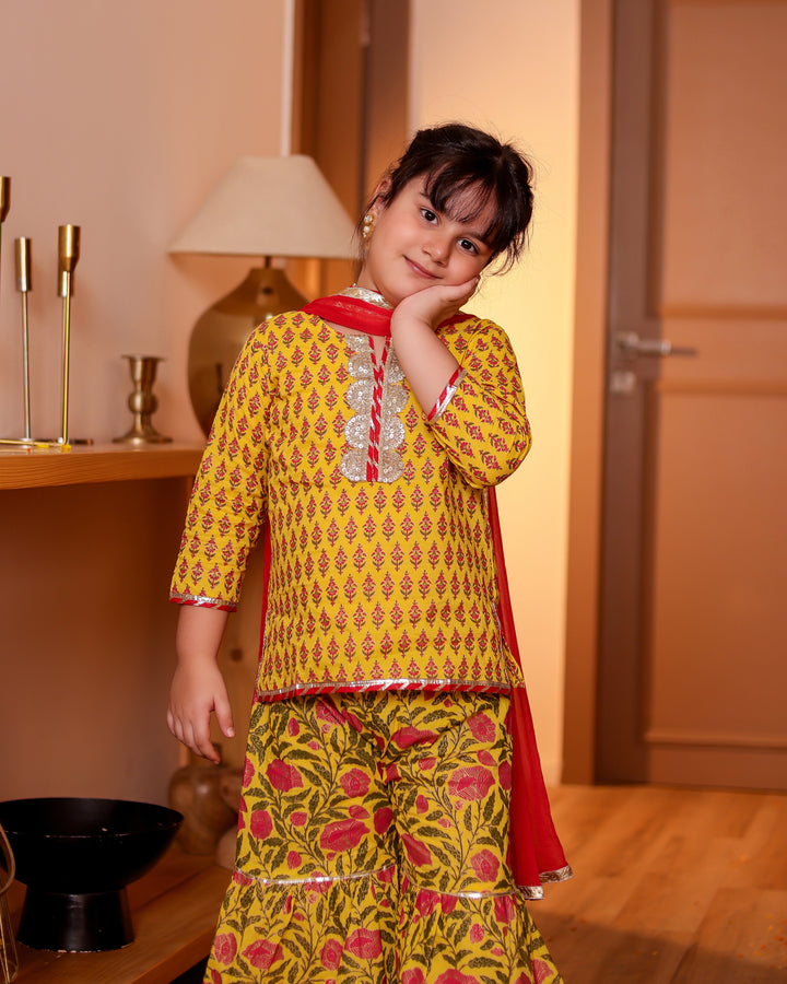 Girls Bright Yellow Floral Printed Kurti & Tiered Sharara with Red Dupatta (Set of 3)