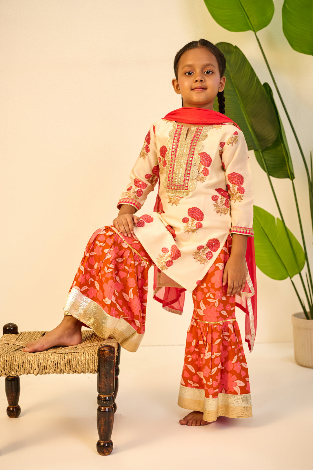 BOYS ORANGE FLORAL MODAL KURTA WITH PAJAMA (SET OF 3) + GIRLS ORANGE FLORAL HANDBLOCK CHANDERI KURTI WITH MODAL SHARARA AND DUPATTA (SET OF 3)