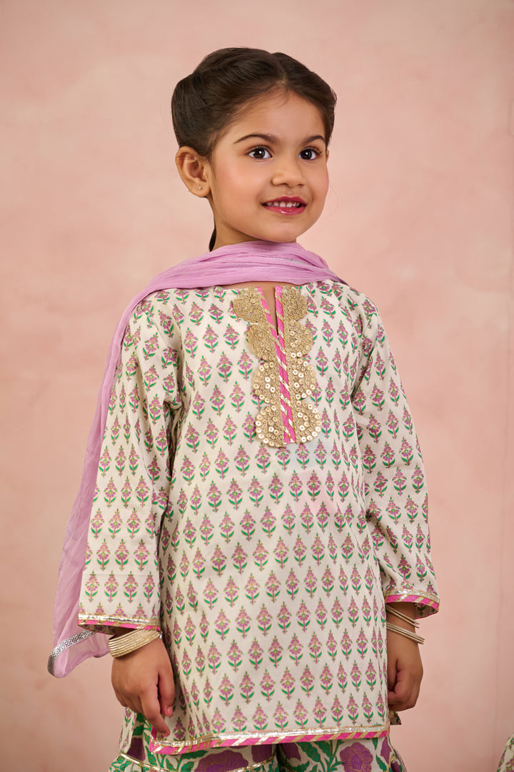 BOYS WHITE GOLD KURTA WITH PAJAMA (SET OF 2) + GIRLS OFF WHITE KURTI WITH PURPLE JAAL SHARARA AND DUPATTA (SET OF 3)