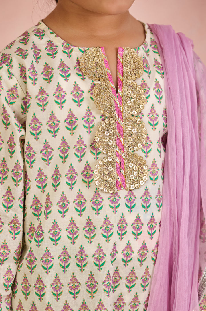 GIRLS OFF WHITE KURTI WITH PURPLE JAAL SHARARA AND DUPATTA (SET OF 3)