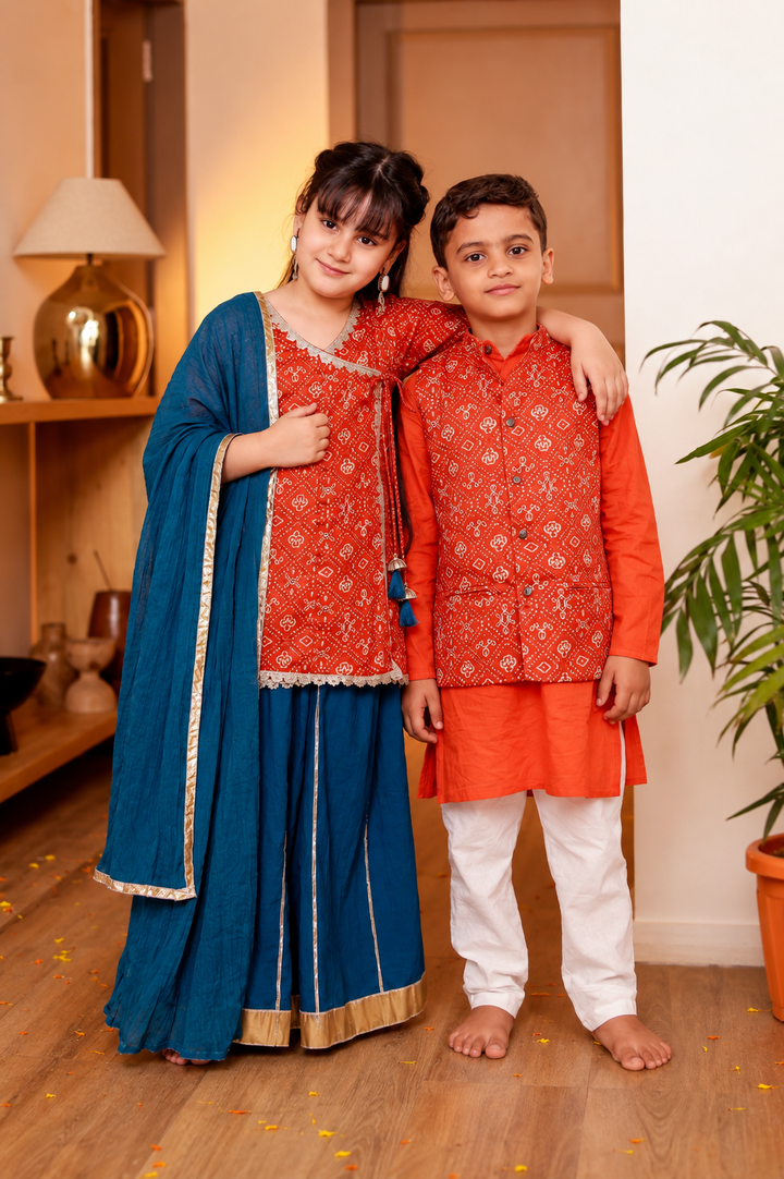Girls Muslin Rust Orange Bandhani Angrakha Kurti & Blue Skirt with Dupatta (Set of 3) + Boys Rust Orange Bandhani Printed Jacket with Kurta & Pyjama 3-Piece Set