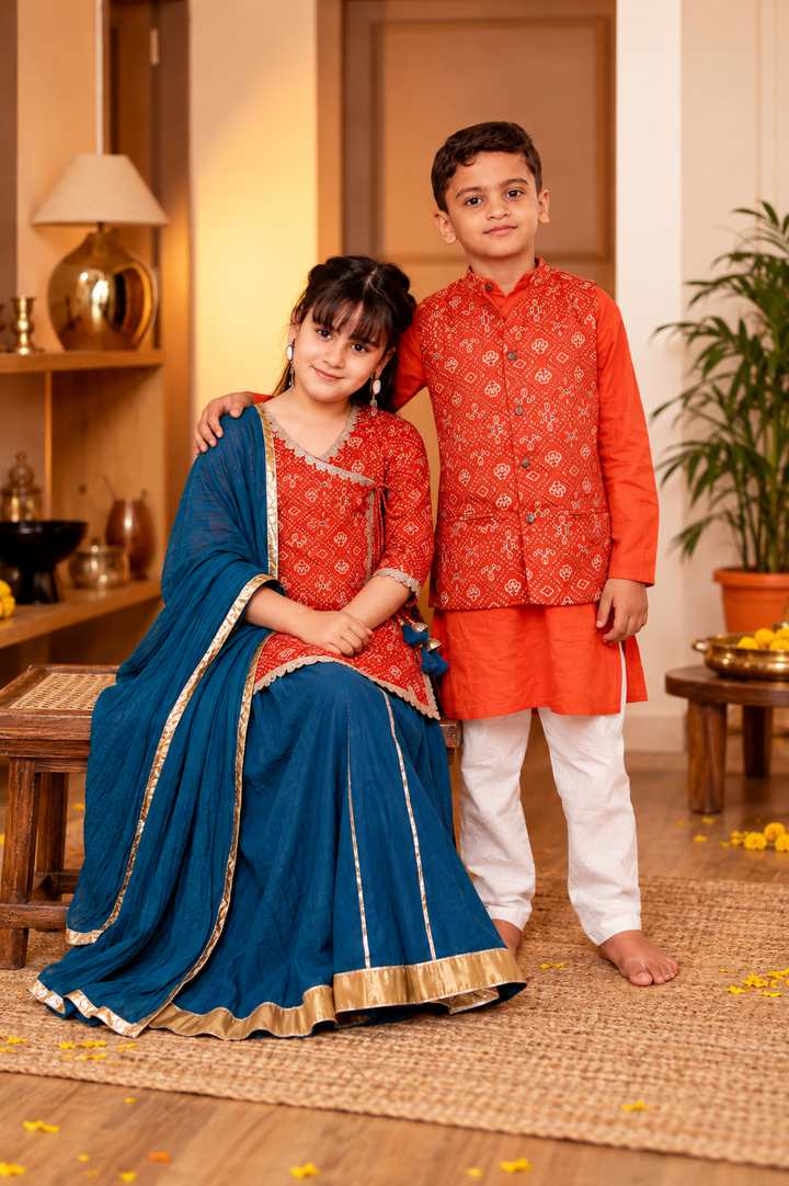 Girls Muslin Rust Orange Bandhani Angrakha Kurti & Blue Skirt with Dupatta (Set of 3) + Boys Rust Orange Bandhani Printed Jacket with Kurta & Pyjama 3-Piece Set