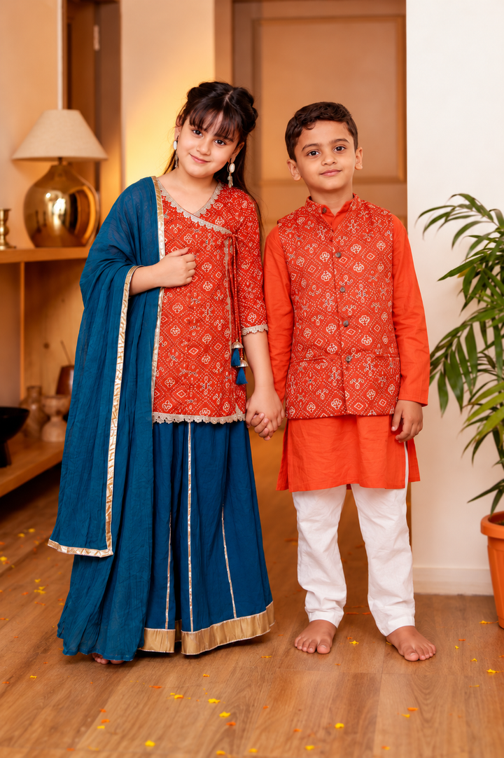 Girls Muslin Rust Orange Bandhani Angrakha Kurti & Blue Skirt with Dupatta (Set of 3) + Boys Rust Orange Bandhani Printed Jacket with Kurta & Pyjama 3-Piece Set