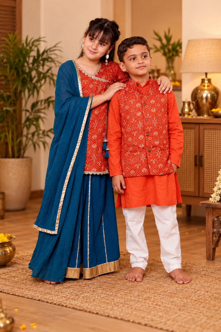 Girls Muslin Rust Orange Bandhani Angrakha Kurti & Blue Skirt with Dupatta (Set of 3) + Boys Rust Orange Bandhani Printed Jacket with Kurta & Pyjama 3-Piece Set
