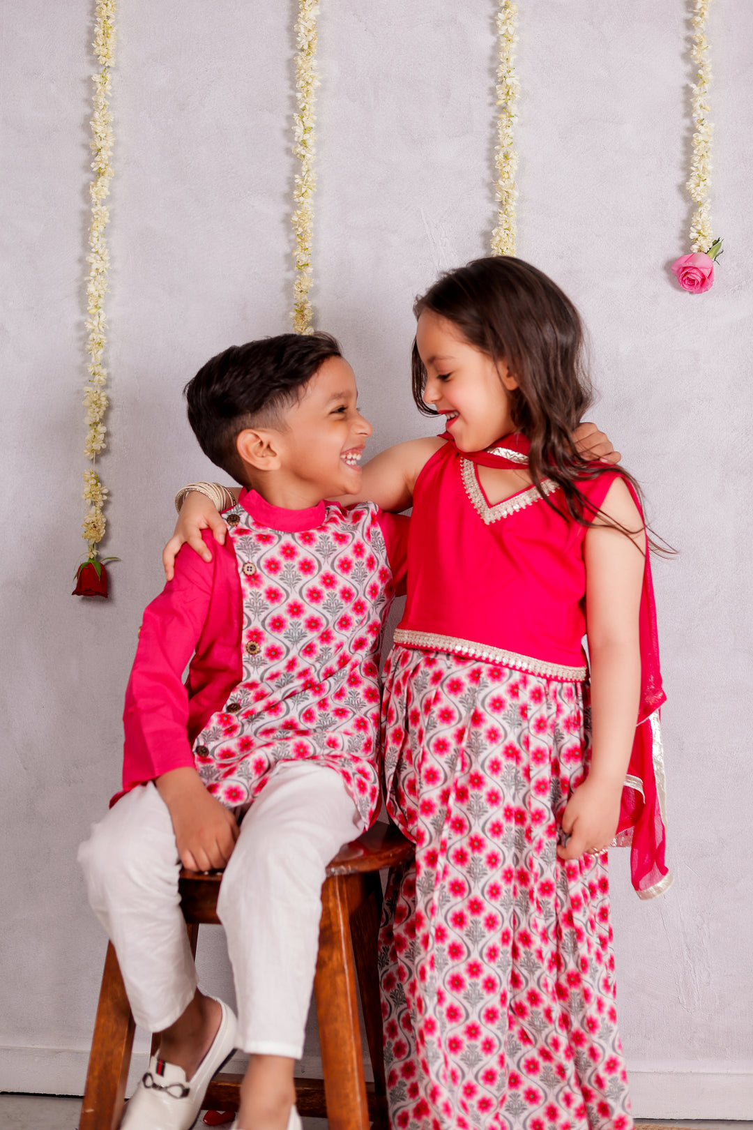 BOYS PINK FLORAL SIDE BUTTON KURTA WITH PAJAMA (SET OF 2) + GIRLS PINK FLORAL LEHENGA WITH FUCHSIA TOP AND DUPATTA (SET OF 3)