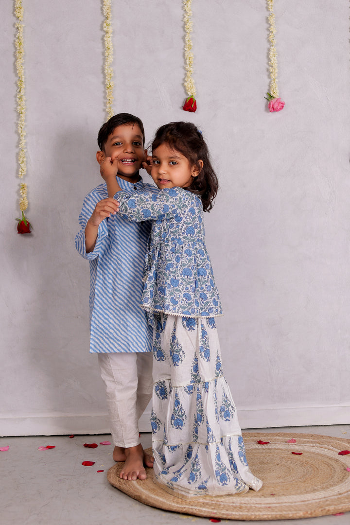 BOYS BLUE LEHERIYA KURTA WITH PAJAMA (SET OF 2) + GIRLS WHITE FLORAL ANGRAKHA KURTI WITH WHITE FLORAL SHARARA (SET OF 2)