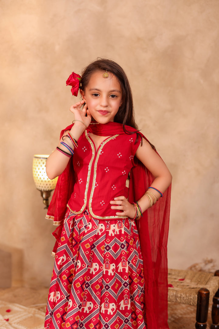 BOYS MAROON PATOLA PRINT JACKET WITH MAROON KURTA AND PAJAMA (SET OF 3) + GIRLS MAROON PATOLA PRINT LEHENGA WITH SLEEVELESS TOP AND DUPATTA (SET OF 3)